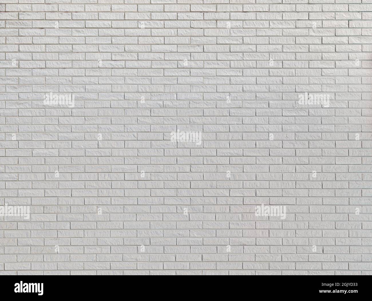 White new brick wall viewed from the front. High resolution full frame textured background. Copy space. Stock Photo