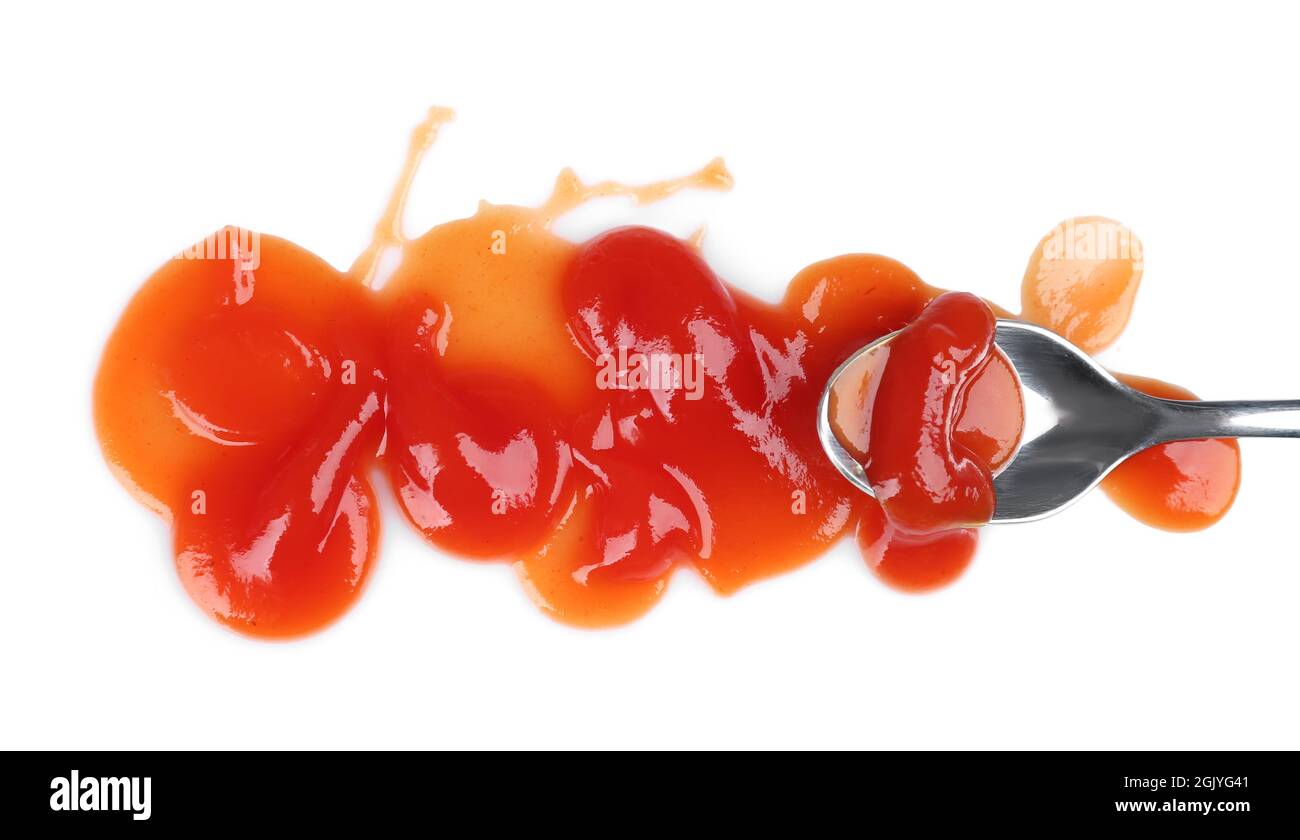 Delicious tomato sauce on white background with spoon Stock Photo Alamy