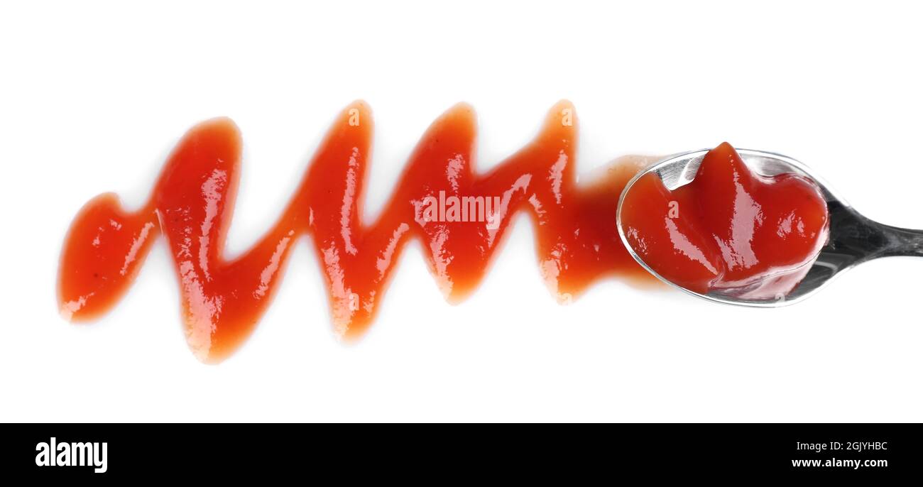 Delicious tomato sauce on white background with spoon Stock Photo Alamy