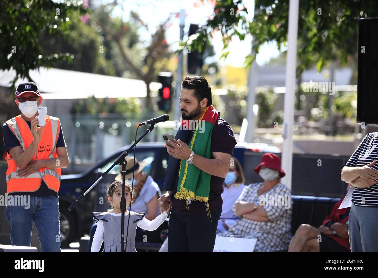 Brisbane, Australia. 12th Sep, 2021. Afghan protester Sayed sings during the demonstration.The Refugee Action Collective organized a rally in Brisbane's King George Square to call for more assistance for people escaping Taliban rule in Afghanistan, as well as more permanent visas, an end to the ban on UNHCR-recognized refugees entering via Indonesia and family reunion rights. Credit: SOPA Images Limited/Alamy Live News Stock Photo