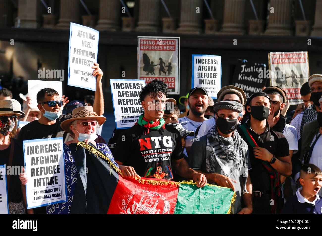 Refugee Rally Protesters hold placards during the demonstration. The Refugee Action ...