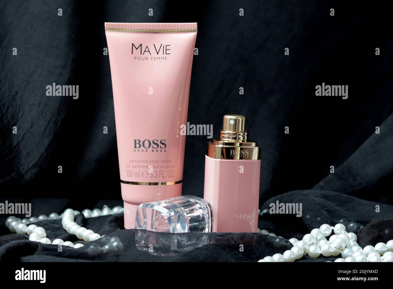 BERLIN, GERMANY - Aug 26, 2021: A Boss Ma Vie Body Lotion with Perfume on  black fabric with pearls Stock Photo - Alamy