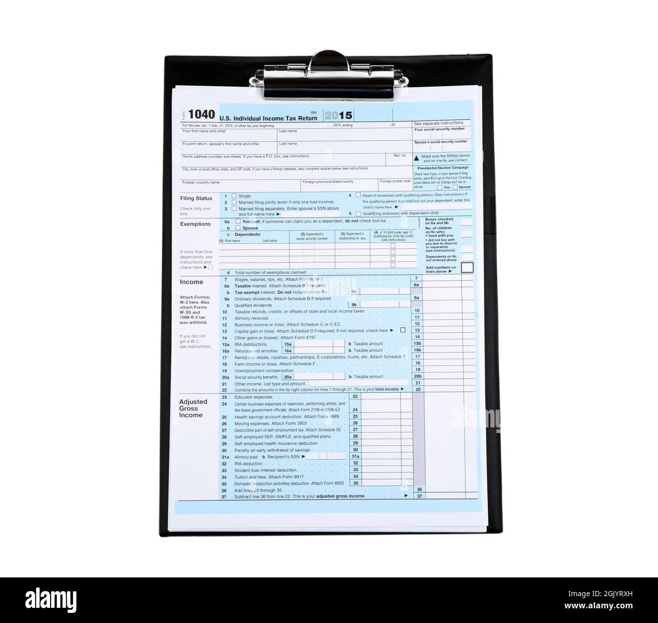 Clipboard with individual tax return form on white background Stock