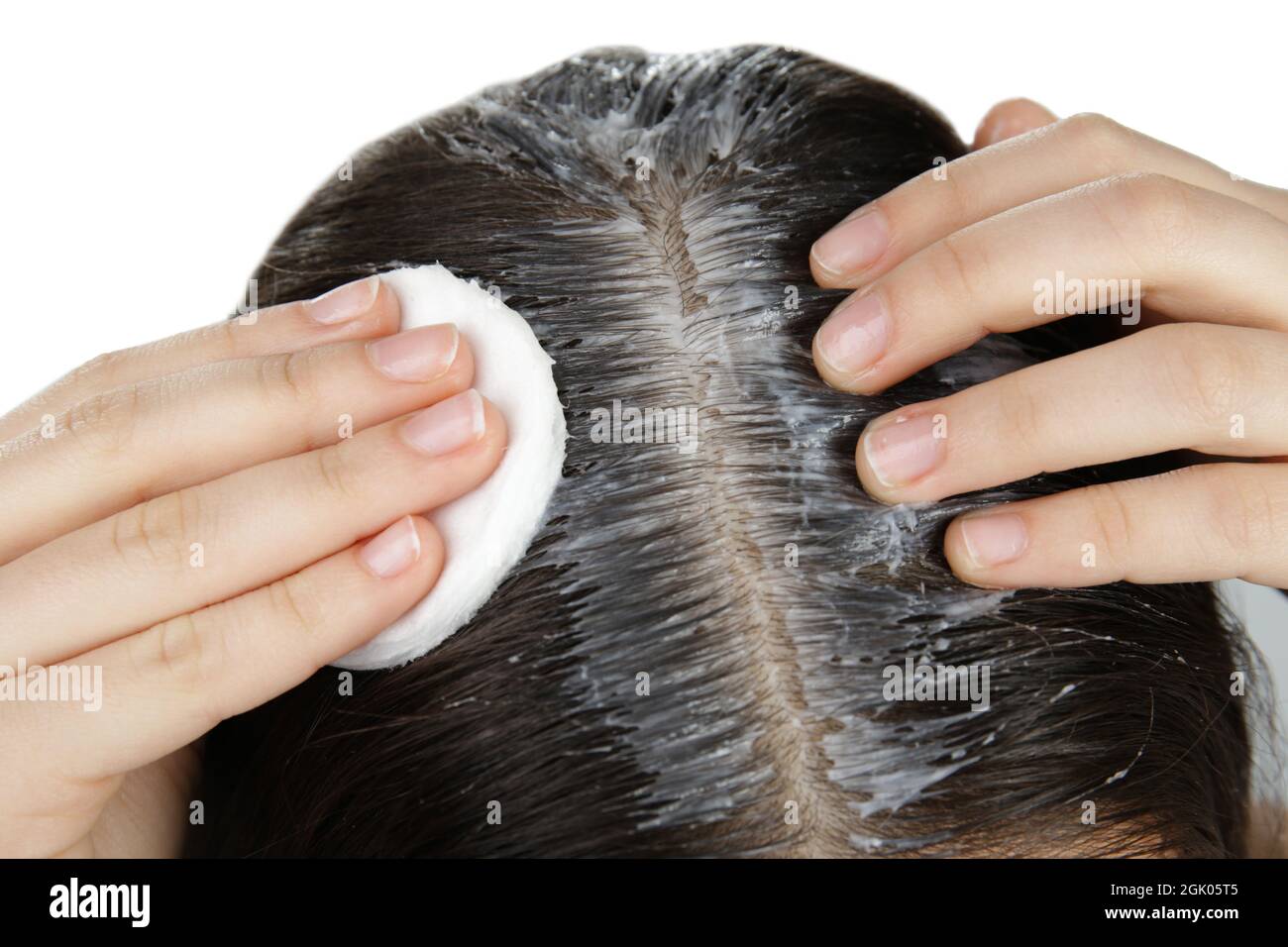 Putting coconut 2024 oil in hair