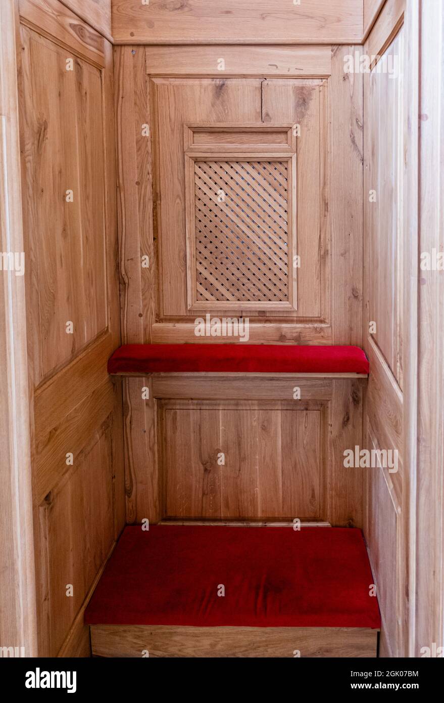 Inside the Confessional box; Roman Catholic Cathedral of Our Lady of Fatima, Karaganda, Kazakhstan, Central Asia Stock Photo