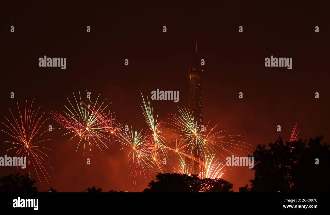 14th July fireworks in Paris. (With the Eiffel Tower in the background) Stock Photo