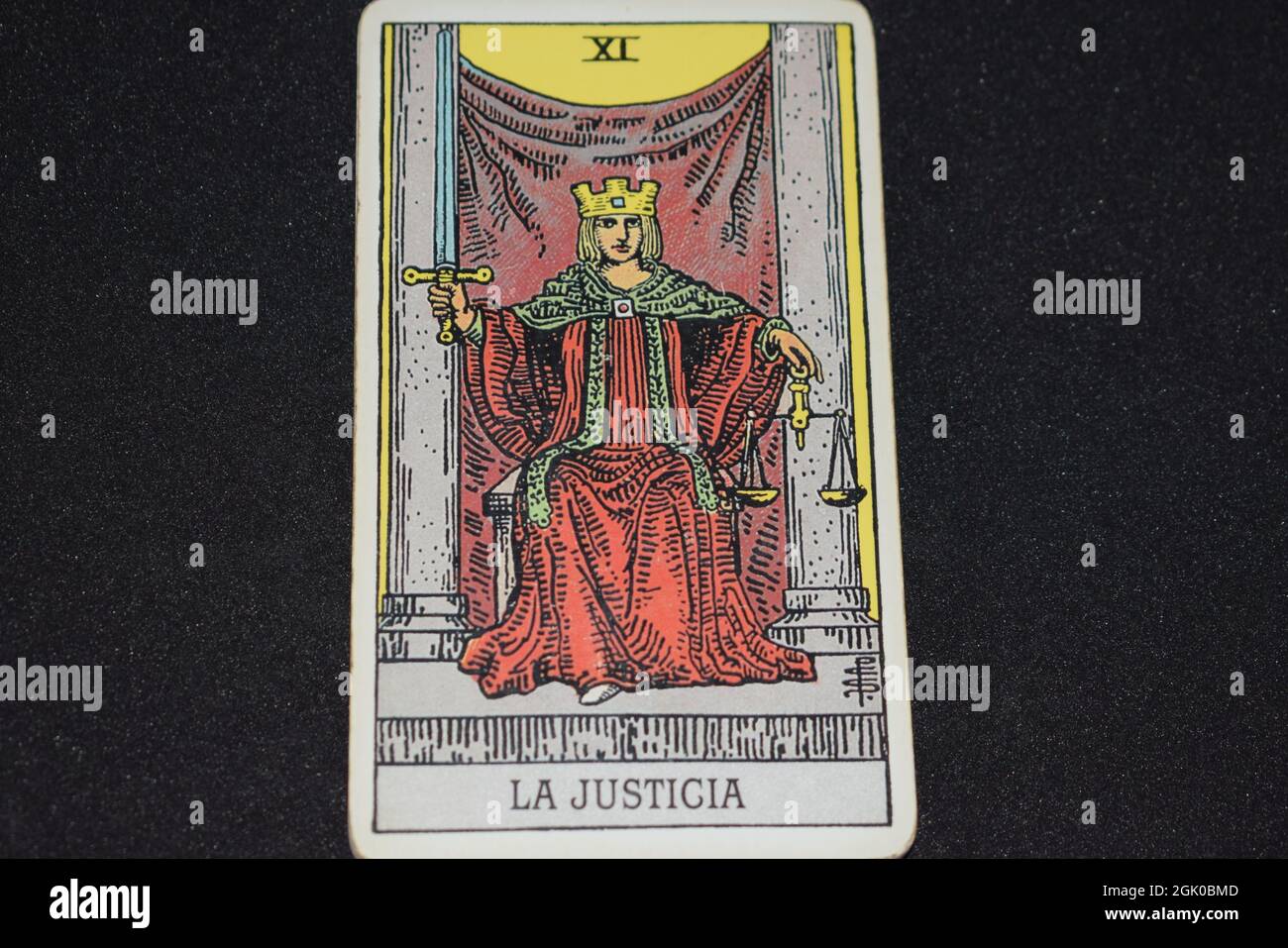 The tarot card number 11 represents JUSTICE in the tarot cards of the