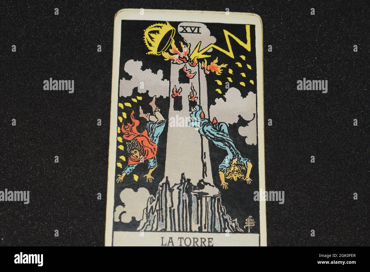 The tarot card number 16 THE in tarot cards the major arcana on a black background Stock Photo - Alamy