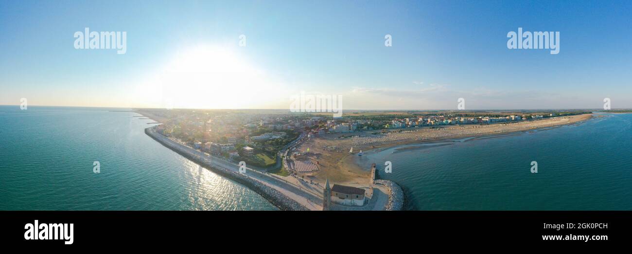Caorle beach - Panoramic view from above in summer on the Madonna dell'Angelo Sanctuary by the sea. Stock Photo