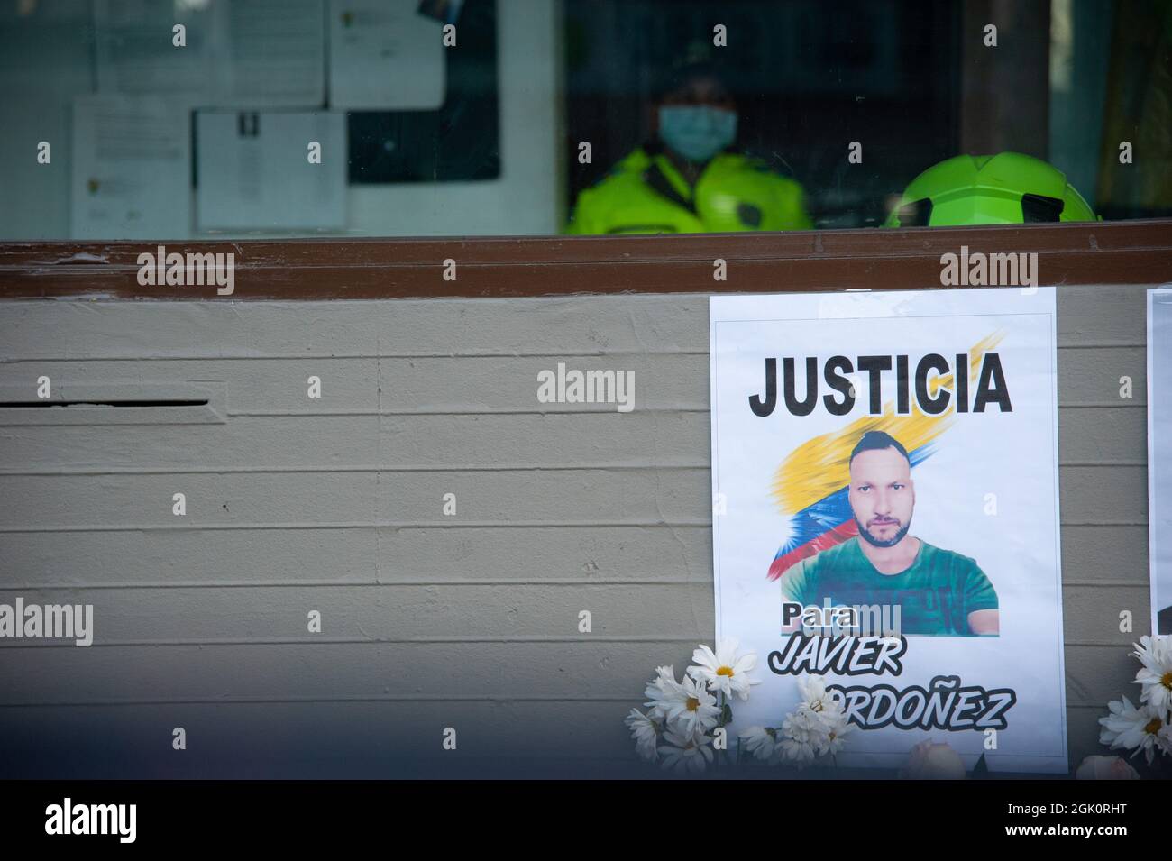 Signs with photos of Javier Ordoñez and flowers as the Villa Luz CAI police station were police officers tortured Javier Ordoñez on September 9, 2020, Stock Photo