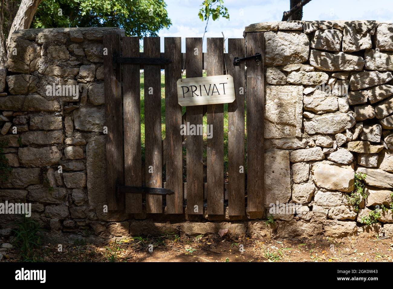 Garden door showing sign 'Private' Stock Photo