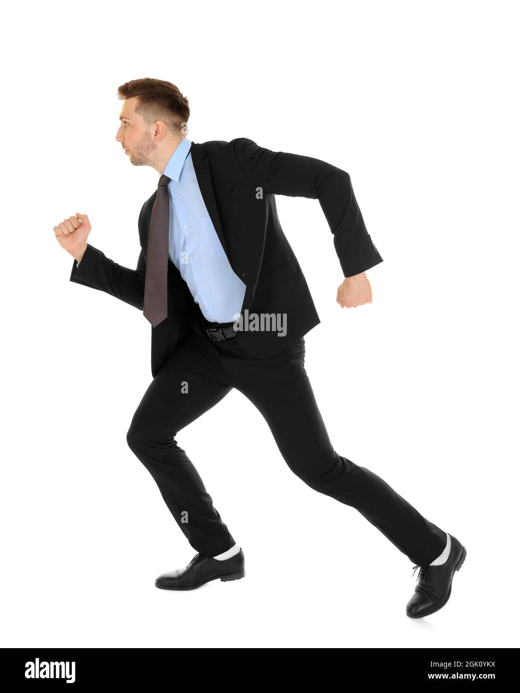 Handsome running businessman on white background Stock Photo - Alamy
