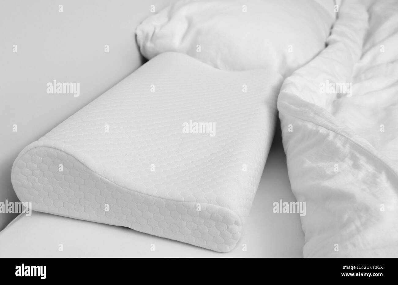 Orthopedic pillow on bed. Physiotherapy concept Stock Photo Alamy