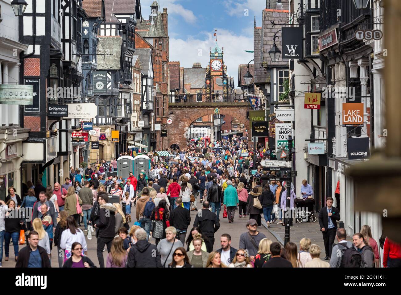 Crowded shoppers in the High Street passing under the Eastgate Clock ...