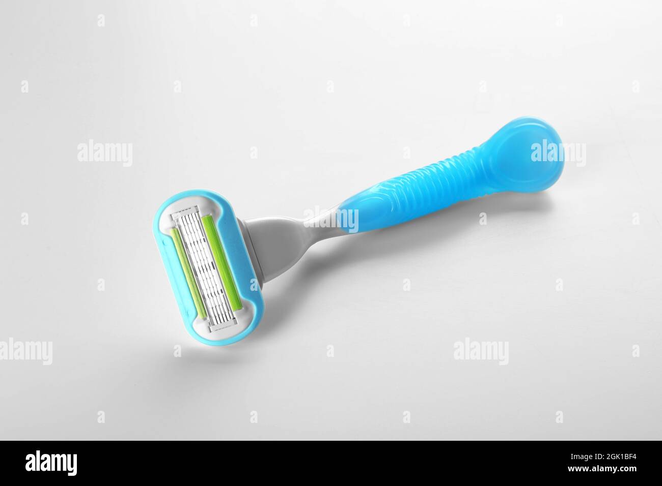 Safety razor on white background Stock Photo - Alamy