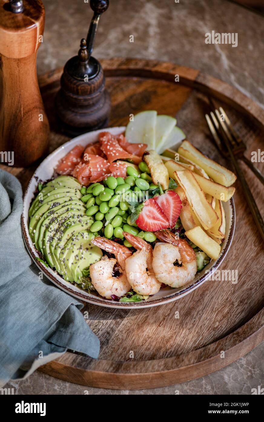 Healthy protein and omega 3 rich Shrimp salmon and avocado bowl