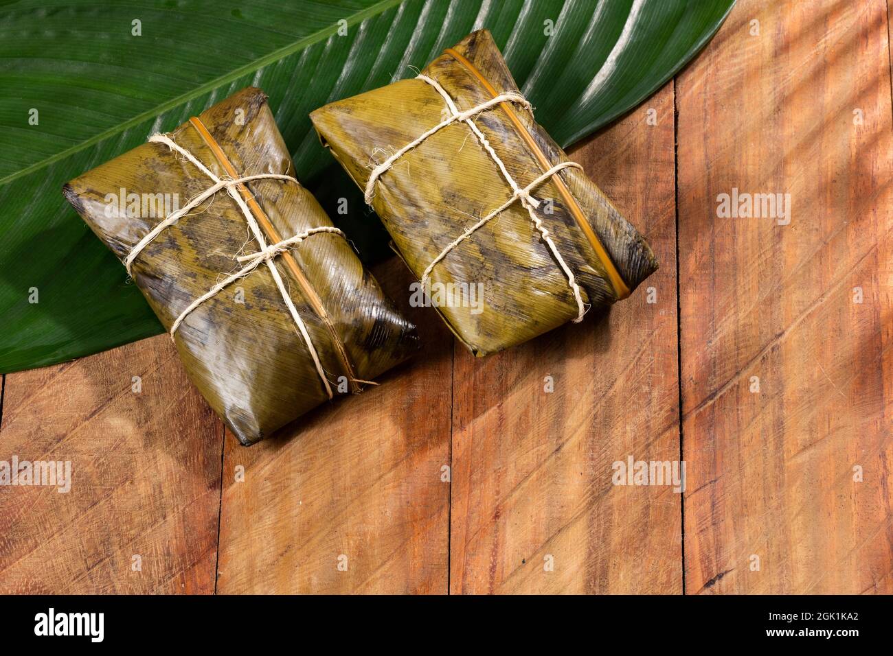 Tamale Typical Colombian Food Wrapped In Banana Leaves Stock Photo Alamy