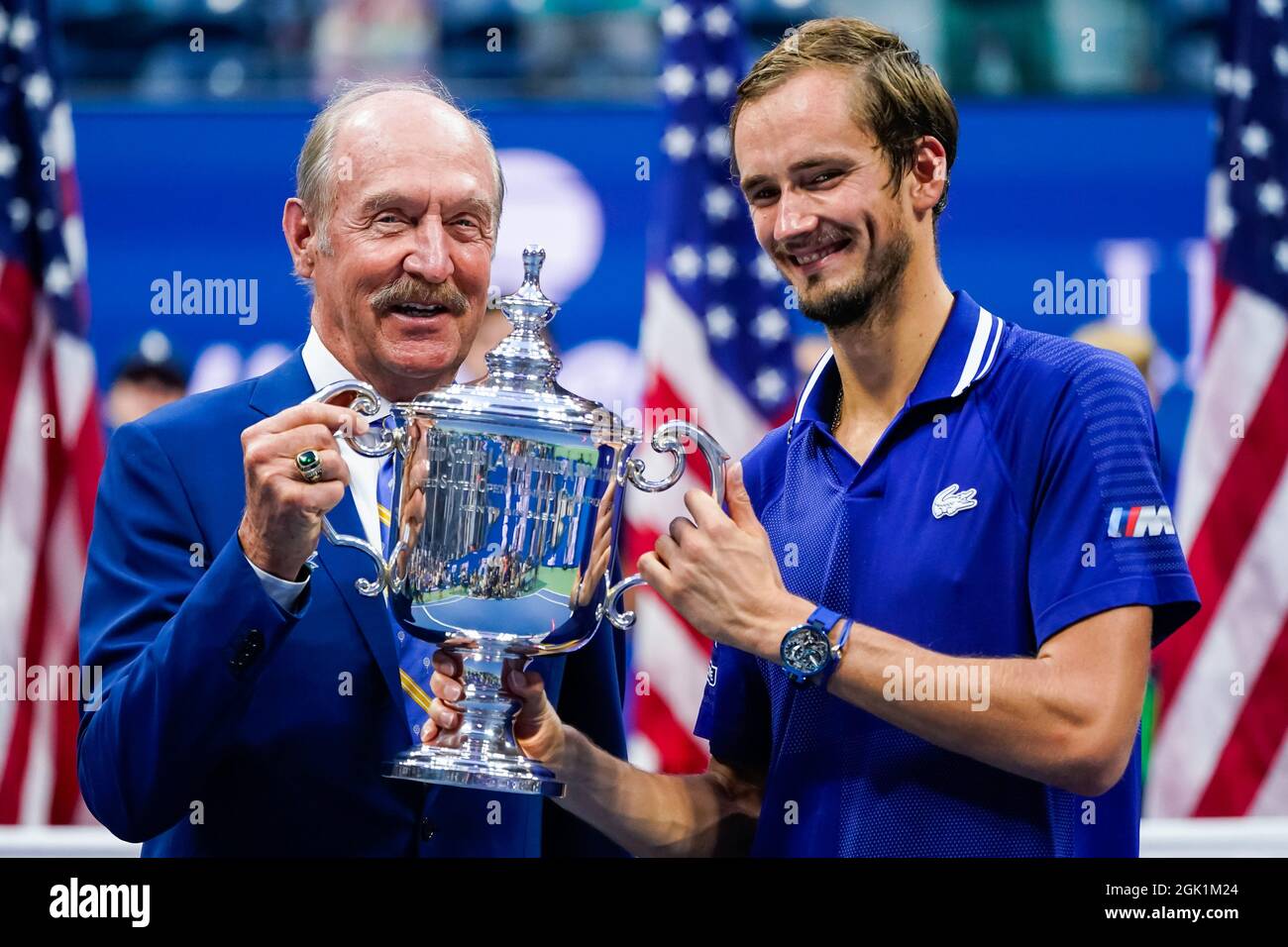 Flushing Meadow, United Stated. 12th Sep, 2021. Former tennis player Stan  Smith and Daniil Medvedev of Russia hold the trophy after his win against  Novak Djokavic of Serbia in the Men's Final