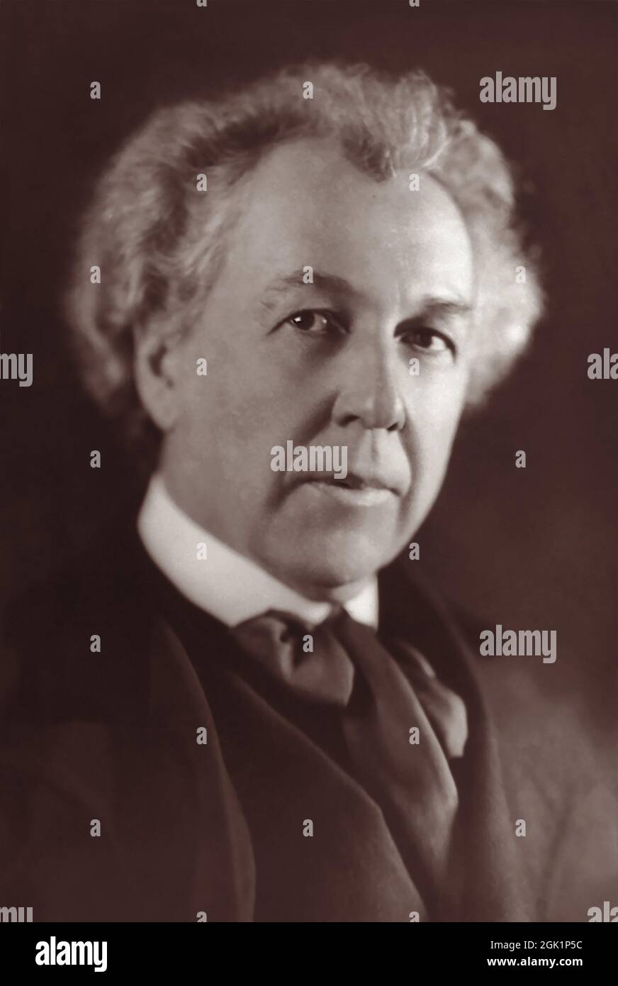 Frank Lloyd Wright (1867-1959), American architect pioneer of what came to be called the Prairie School movement, in a portrait from 1926. Wright would later be recognized (in 1991) by the American Institute of Architects as 'the greatest American architect of all time.' Stock Photo