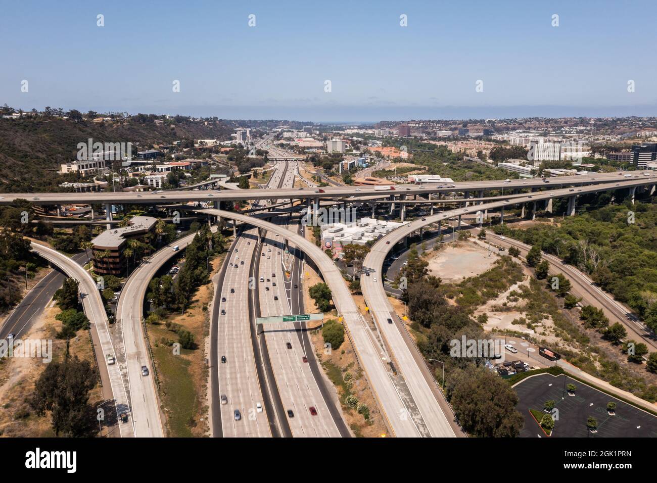 Busy multi-lane freeways and overpass in San Diego, aerial view. Stock Photo