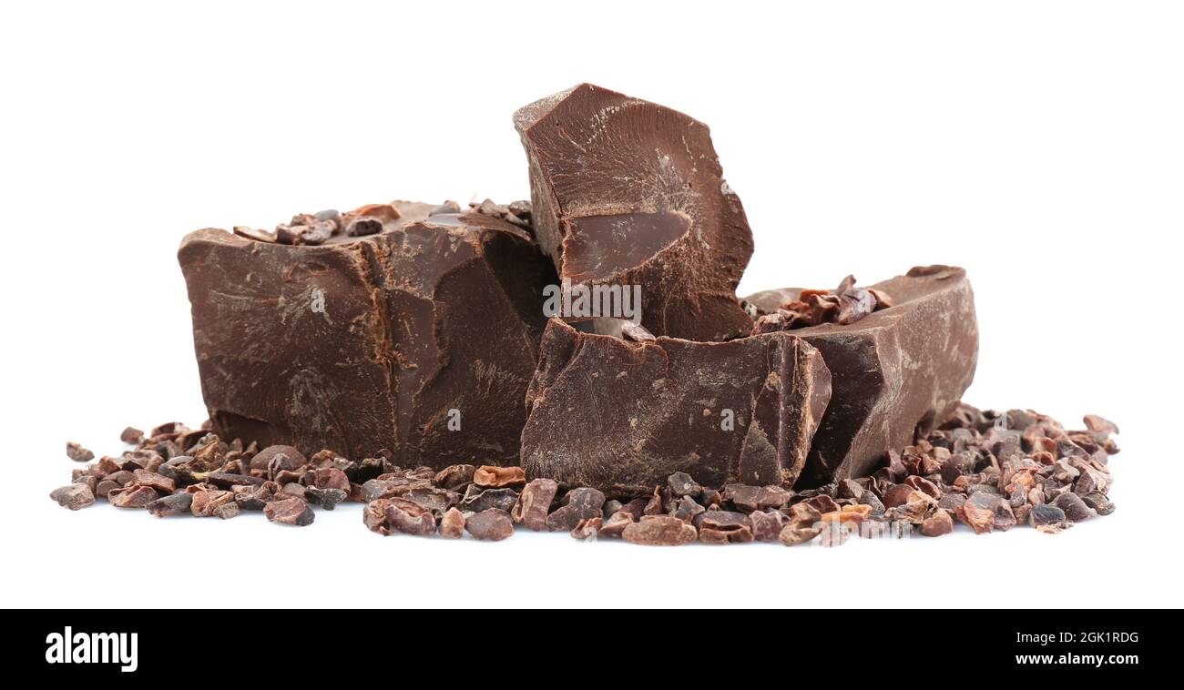 Pile of dark chocolate chunks and cocoa nibs on white background Stock ...