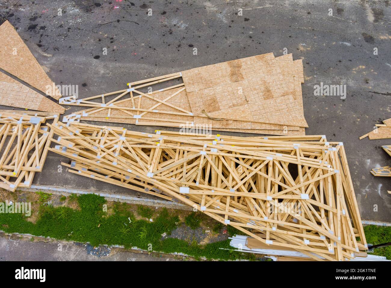 Stacker wooden material boards and beams for new house on of under