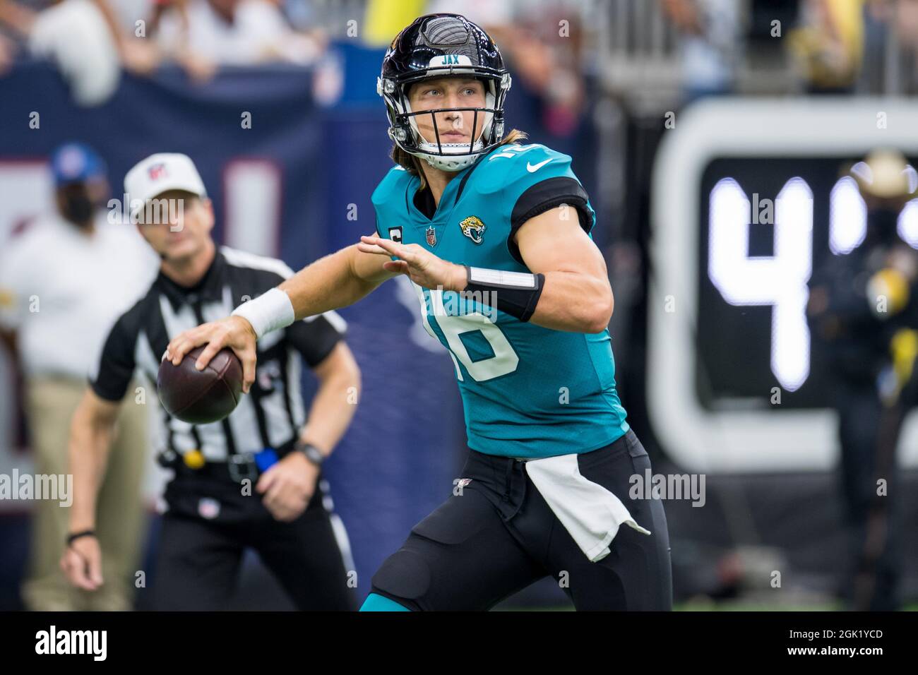 Jacksonville Jaguars quarterback Trevor Lawrence (16) prepares to