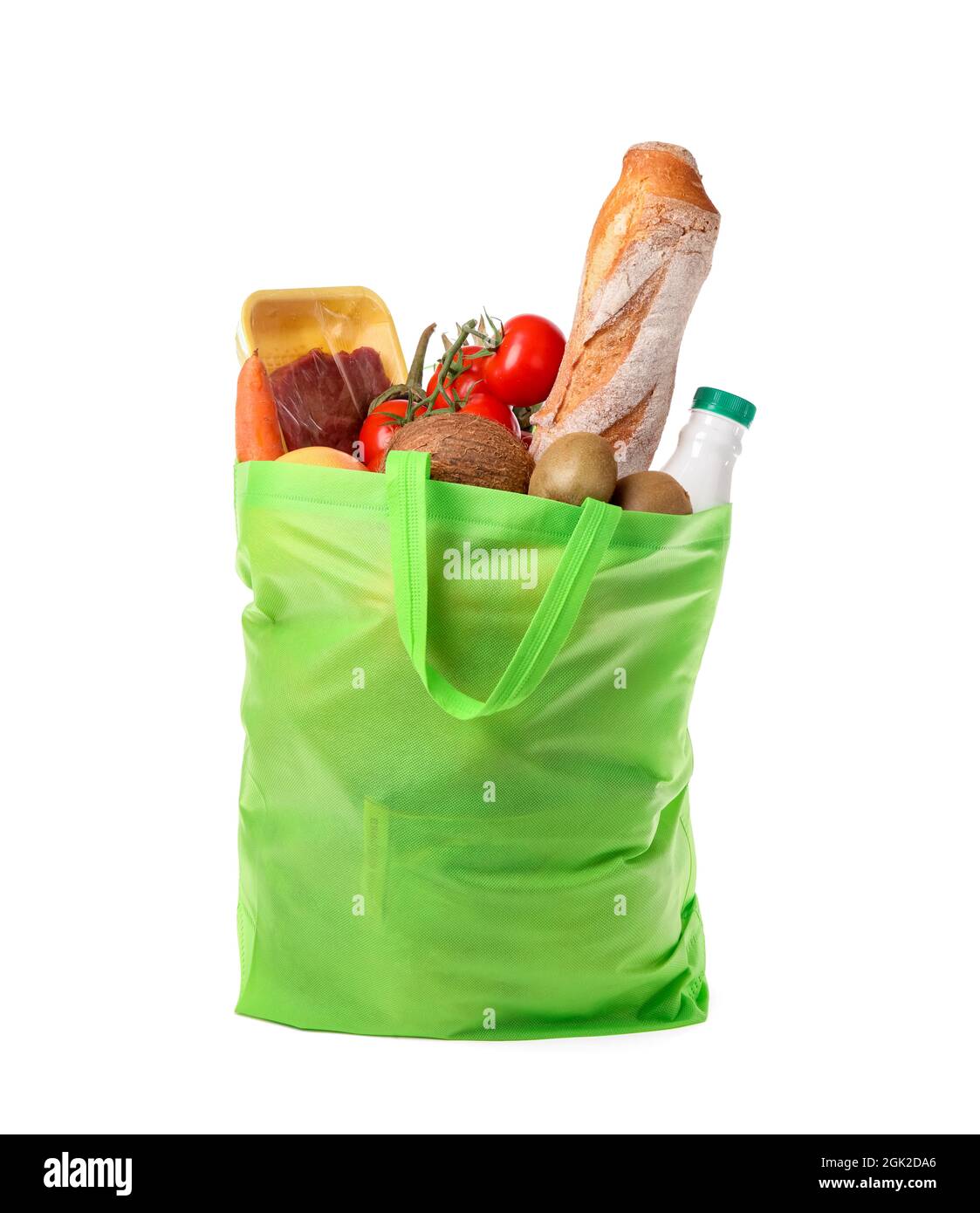 Eco bag with products and bottle of milk on white background Stock Photo