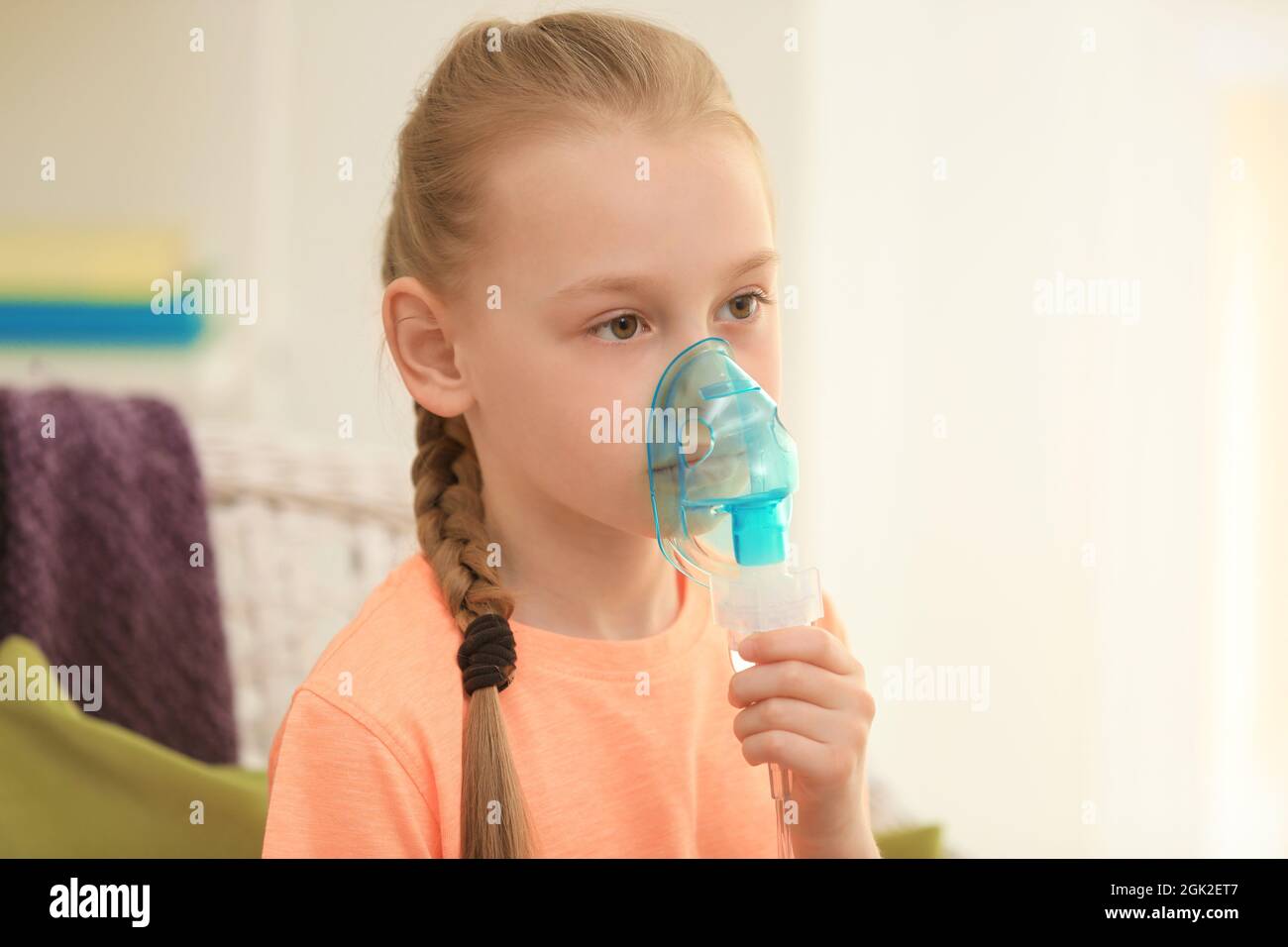 Girl using asthma machine at home Stock Photo Alamy