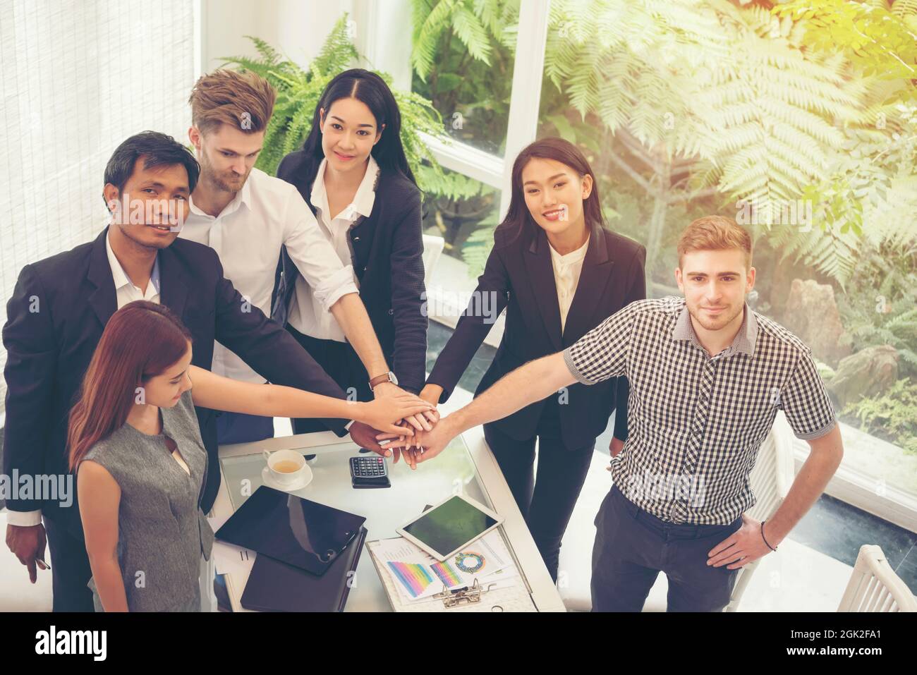 Business Partners Trust in Team with hands together to Greeting Start up project Contractor. Businessman Teamwork are Partnership in Office of Team Me Stock Photo