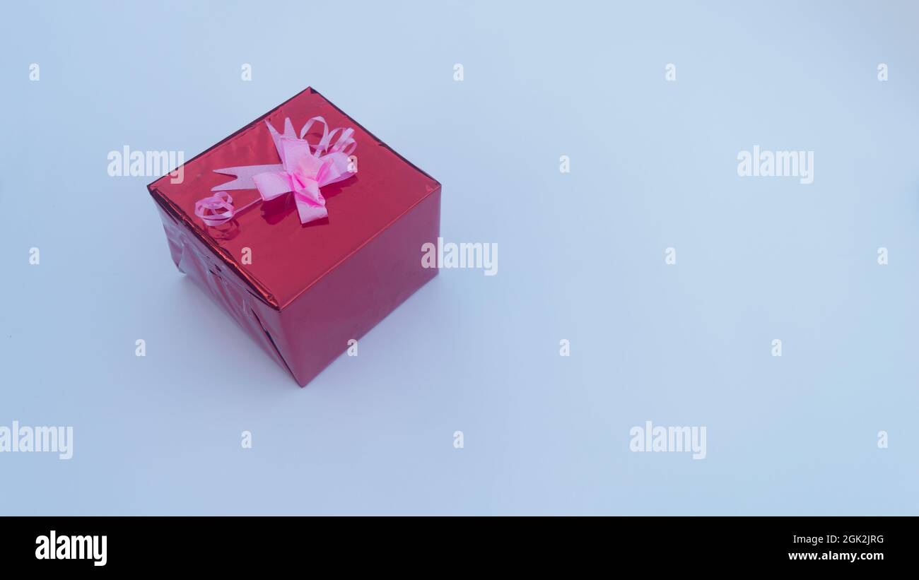 Red Gift box with Ribbon in white background. Copy Space Stock Photo ...