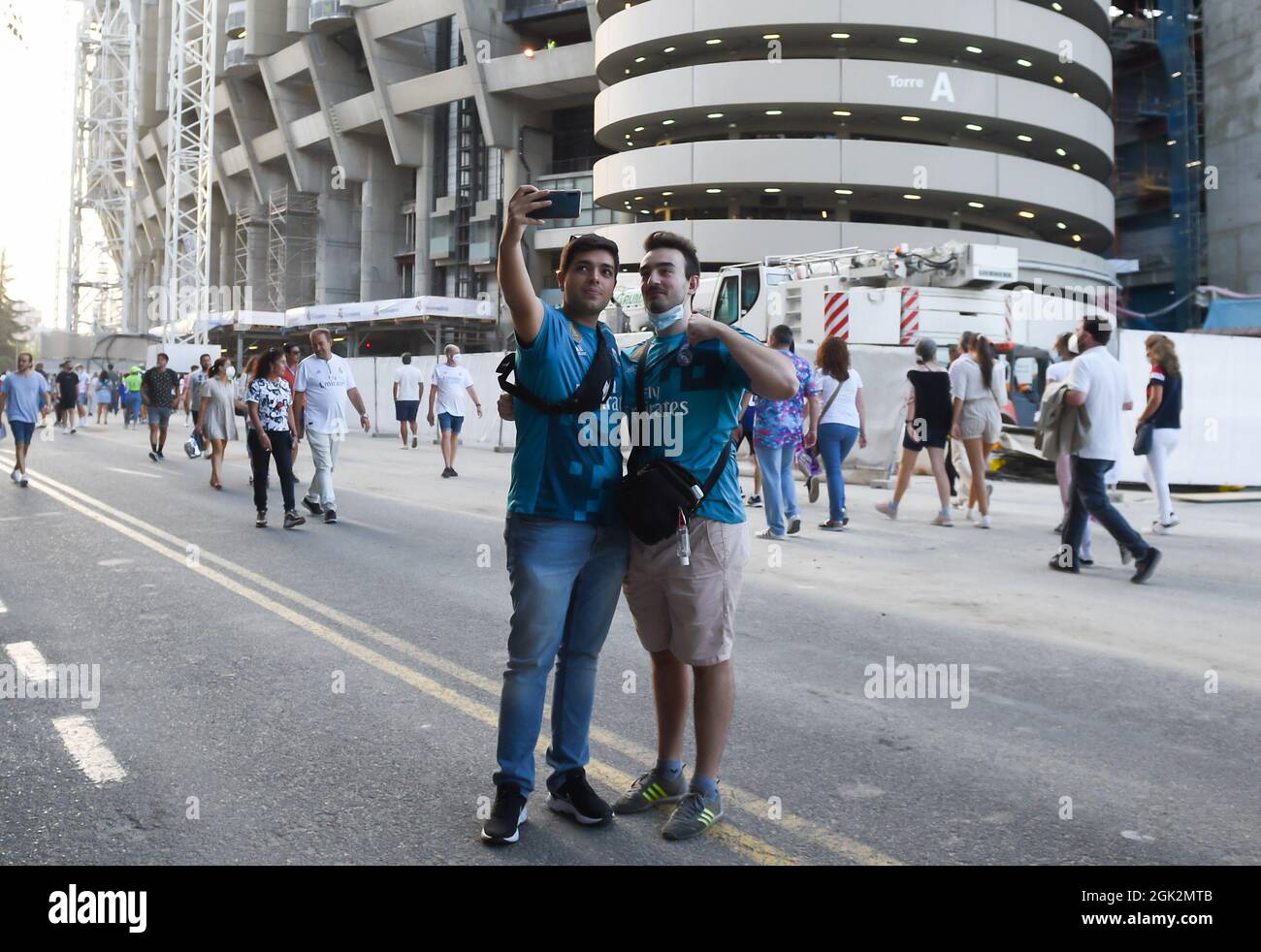 Madrid, Spain. 12th Sep, 2021. Fans are seen outside the reopened Santiago Bernabeu stadium before a Spanish league football match between Real Madrid and RC Celta in Madrid, Spain, Sept. 12, 2021. Credit: Gustavo Valiente/Xinhua/Alamy Live News Stock Photo