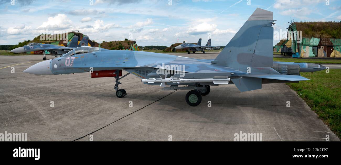 Fighter plane from the SU-27 family with suspended armaments Stock Photo
