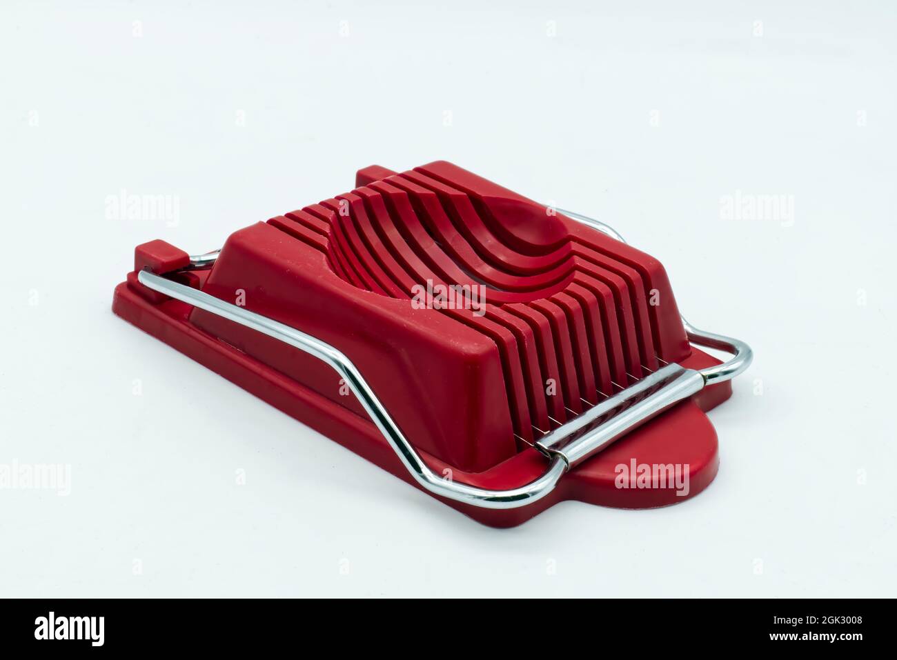 Egg slicer tool isolated on white background Stock Photo