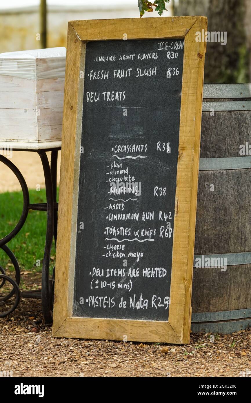 deli or cafe menu on a chalkboard or blackboard outdoors in South Africa Stock Photo