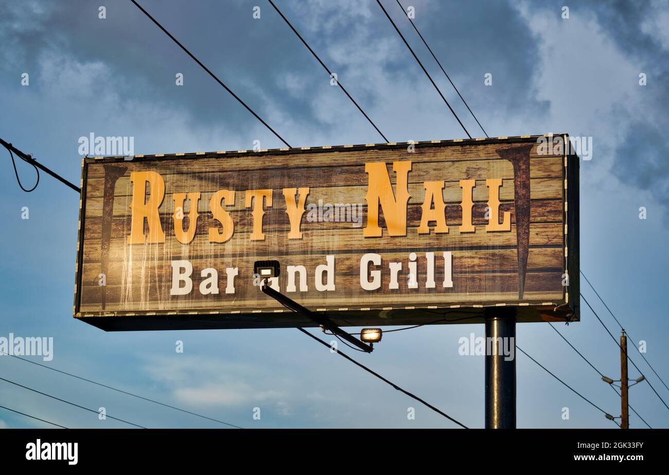 Humble, Texas USA 11-20-2019: Rusty Nail Bar and Grill road sign in Humble, TX. Stock Photo