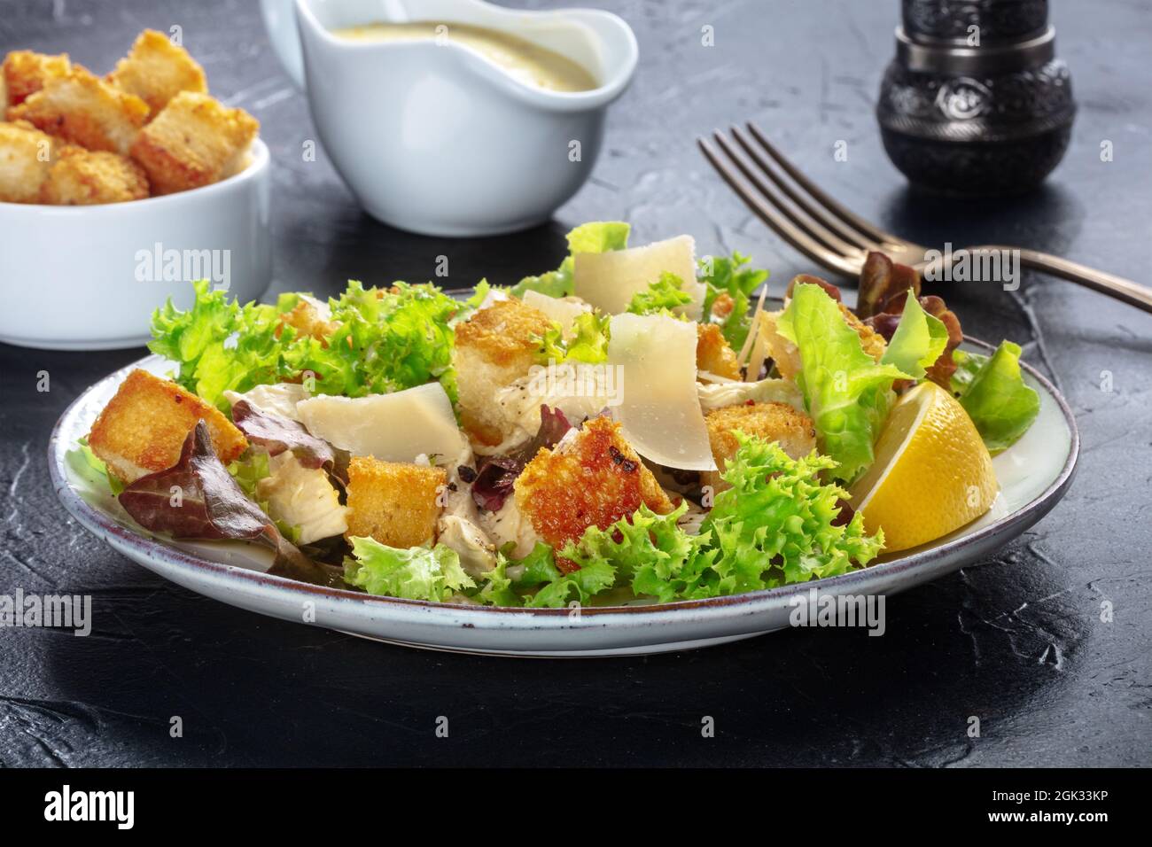Chicken Caesar salad with the classic mayonnaise based sauce, pepper