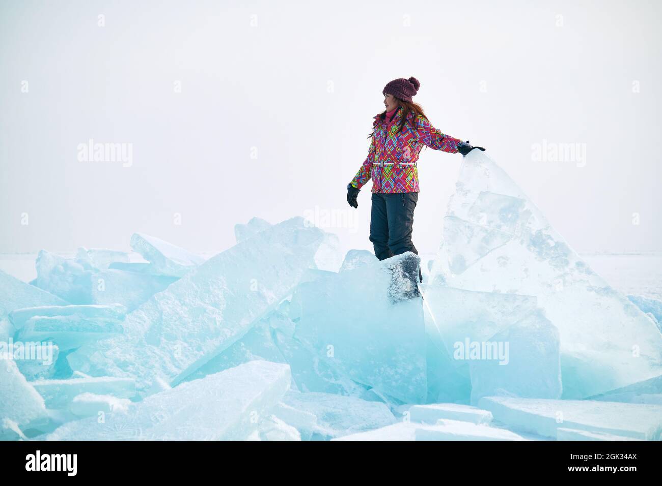 Traveller in a ski suit in Surreal Ice Landscape, Kazakhstan Stock Photo