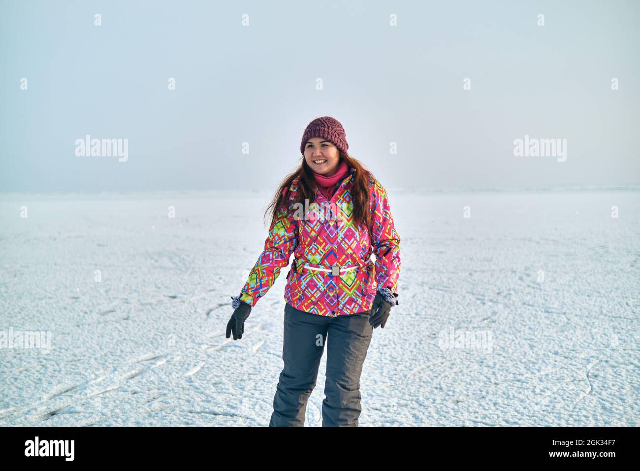 Winter outdoor activities, woman ice skating on a frozen lake Stock ...
