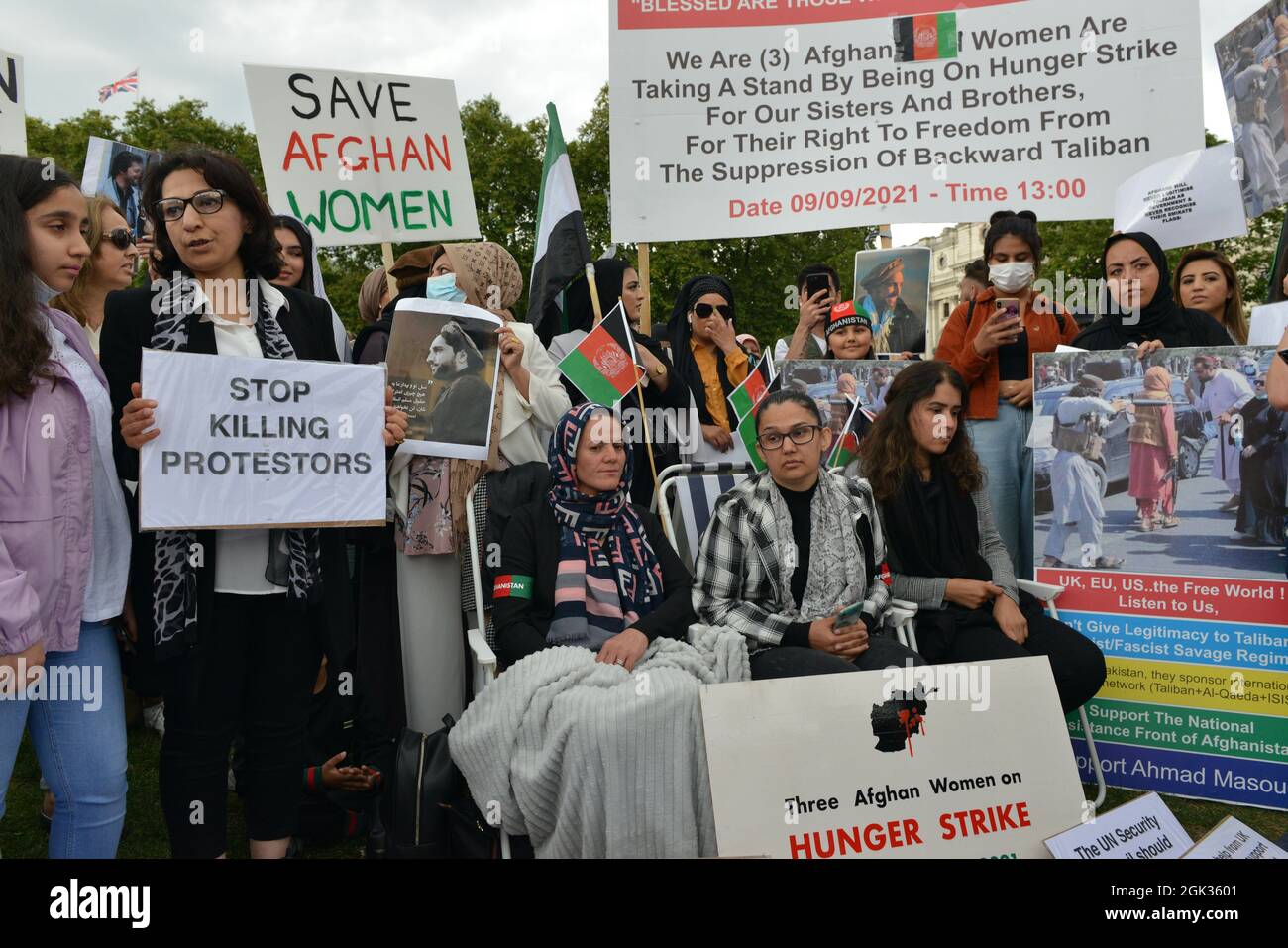 A group of Afghan women demonstrated at Parliament Square to show their
