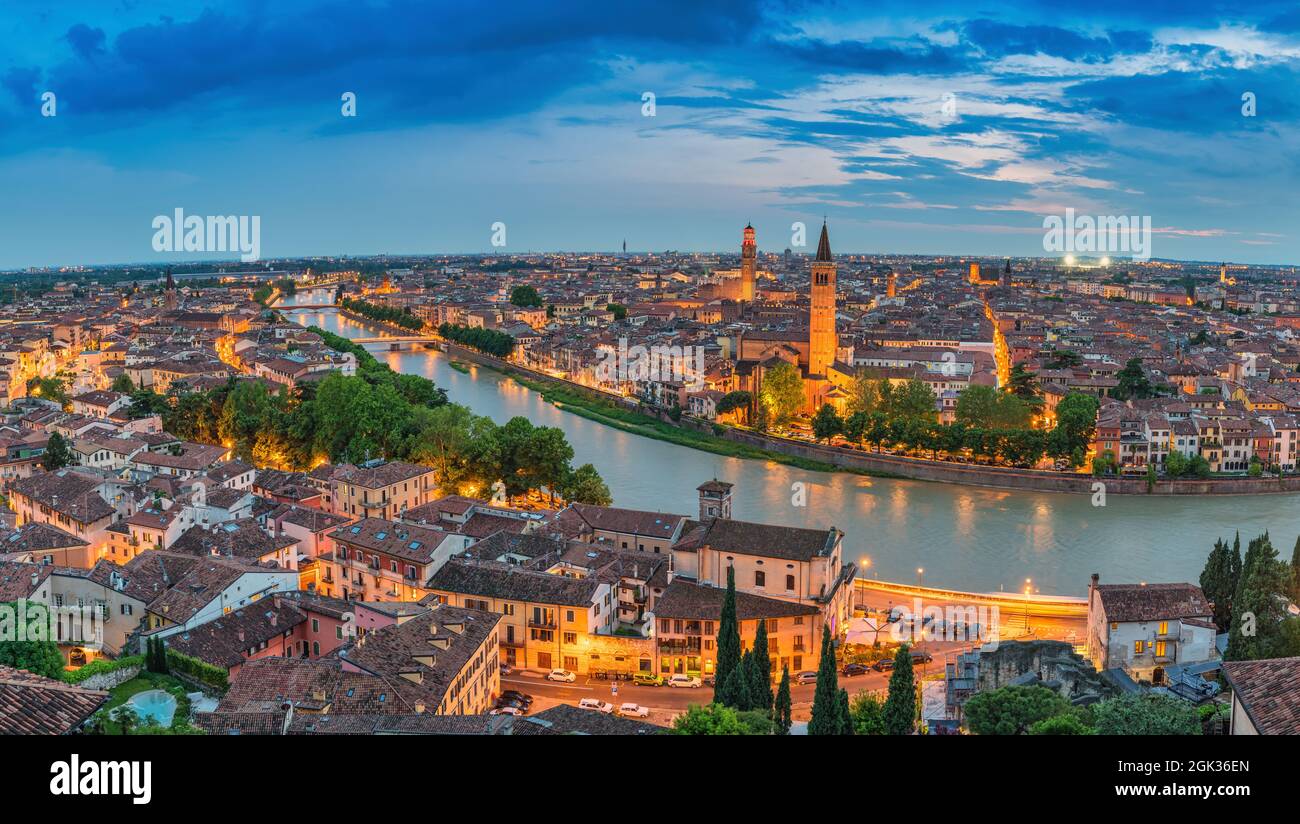 Verona Italy, high angle view panorama night city skyline at Adige river Stock Photo