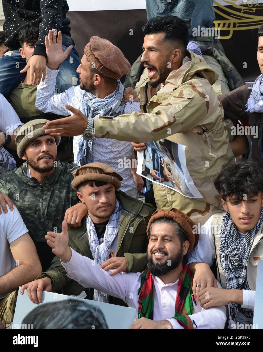 A group of Afghan men protested at Trafalgar Square to show their