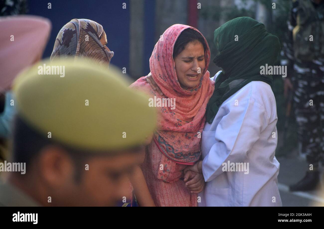 Srinagar. 12th September 2021. Emotional scenes during the wreath laying ceremony of the police officer who was shot dead by militants. A police officer was killed in a militant attack at Khanyar. The SI identified as Arshid Ahmad was a resident of Kulmuna Kupwara. The area was cordoned off and a hunt launched to arrest the attackers. Credit: Majority World CIC/Alamy Live News Stock Photo