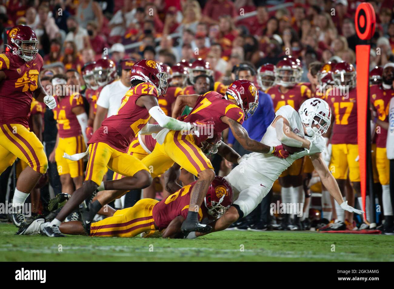Stanford Cardinal wide receiver John Humphreys (5) is tackled by Southern California Trojans cornerback Isaac Taylor-Stuart (6) during a NCAA football Stock Photo