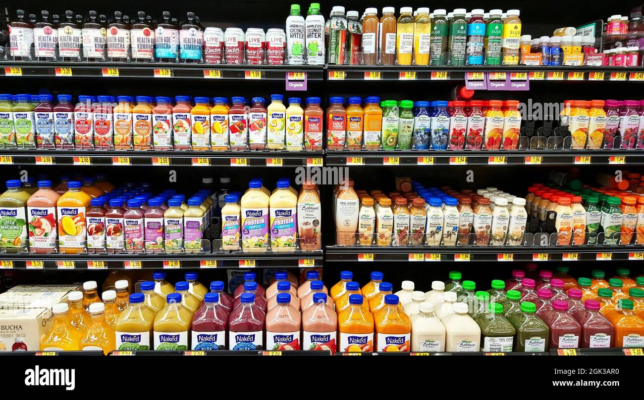 https://c8.alamy.com/comp/2GK3AR0/humble-texas-usa-10-14-2019-walmart-shelves-stocked-with-plastic-juice-bottles-of-various-brands-in-the-cooler-section-location-in-humble-tx-2GK3AR0.jpg