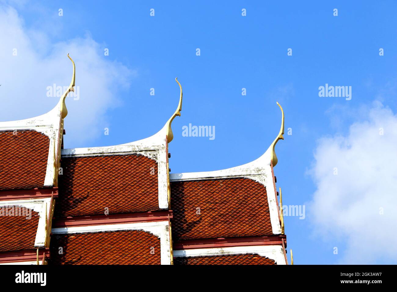 Thai art on the roof, Thai temple church, Thai temple roof style There is a naga-shaped pediment on top. Stock Photo