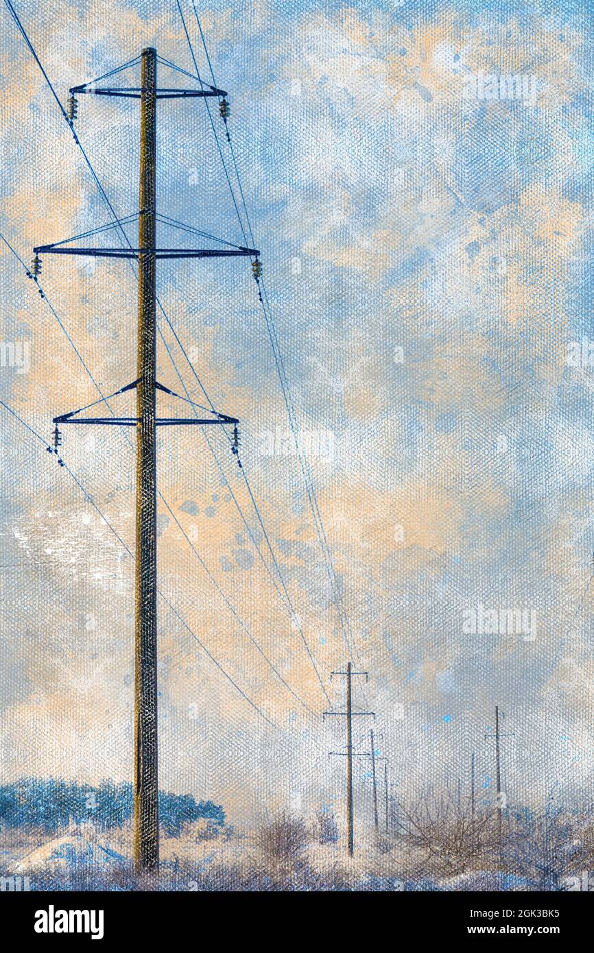 High voltage poles in a snowy field. Power line against a winter Stock ...