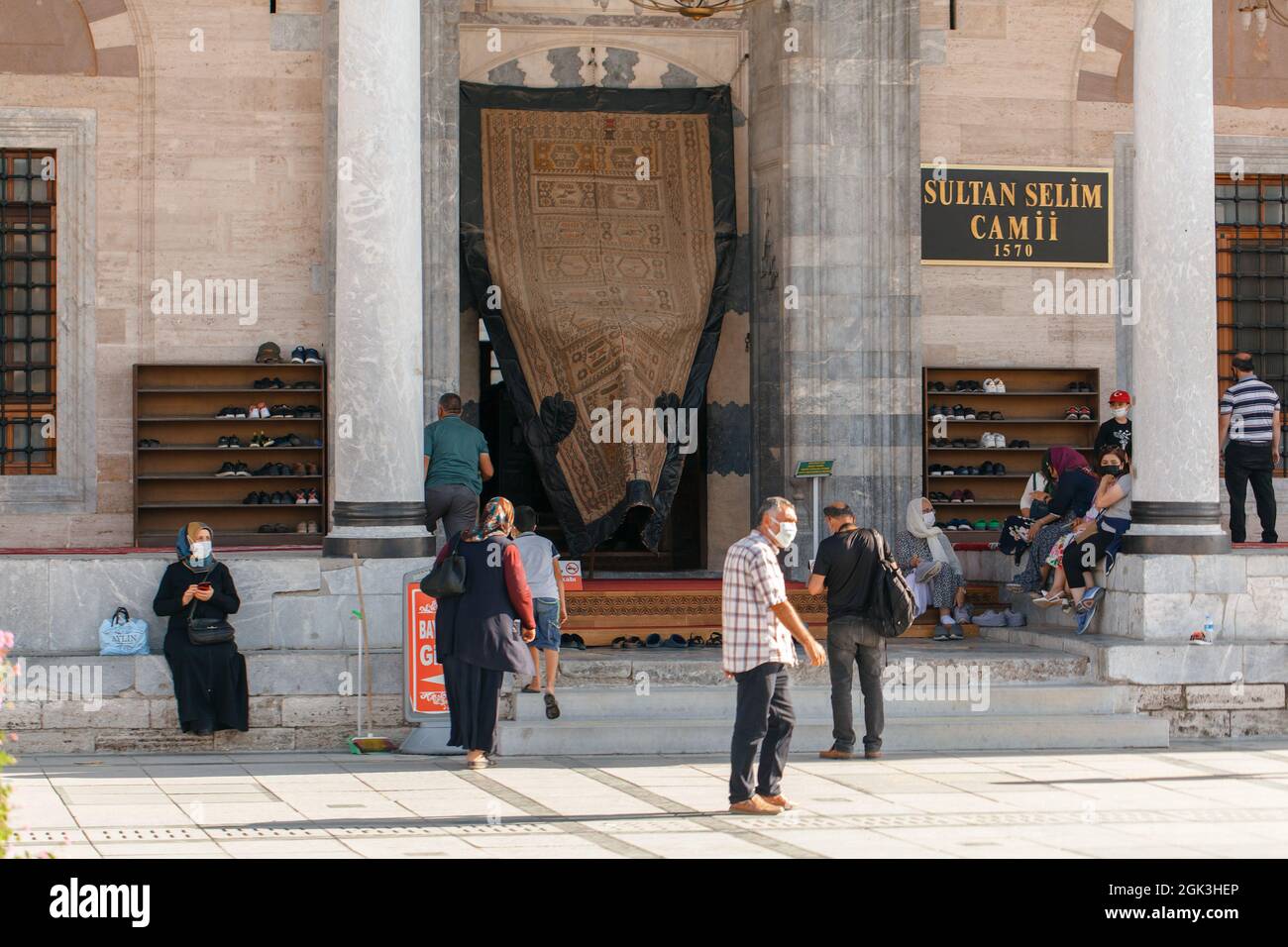 Konya, Turkey-September 05, 2021: People entering Sultan Selim Mosque |  Sultan Selim Camii for prayer in  Mevlana Square in Konya, Turkey. Stock Photo