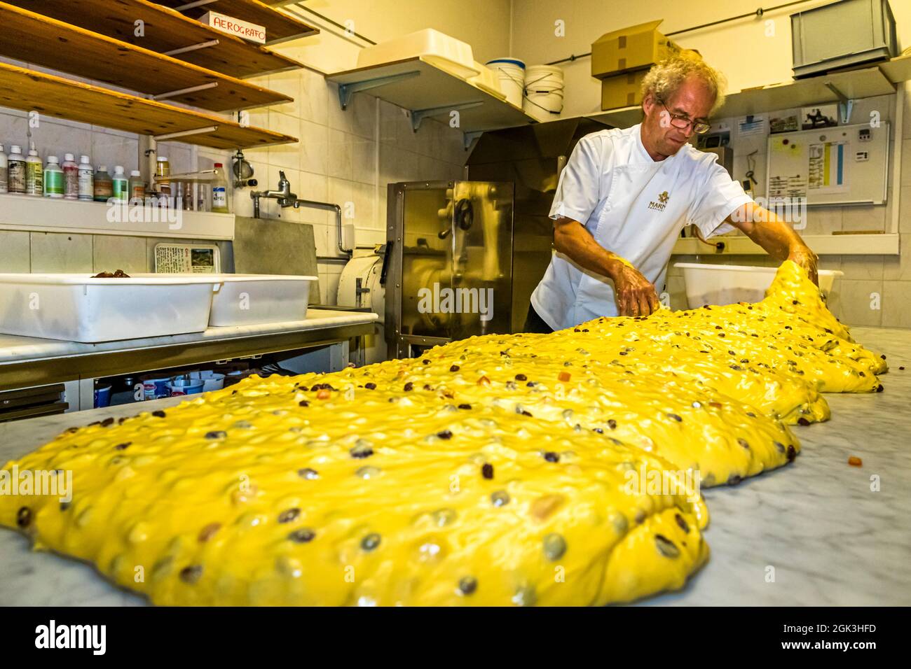 Panettone Prduction in the Pasticceria Marnin in Locarno, Switzerland. Circolo di Locarno, Switzerland. Here the main dough rests for the first time after coming out of the kneading machine in the Pasticceria Marnin in Locarno, Switzerland Stock Photo