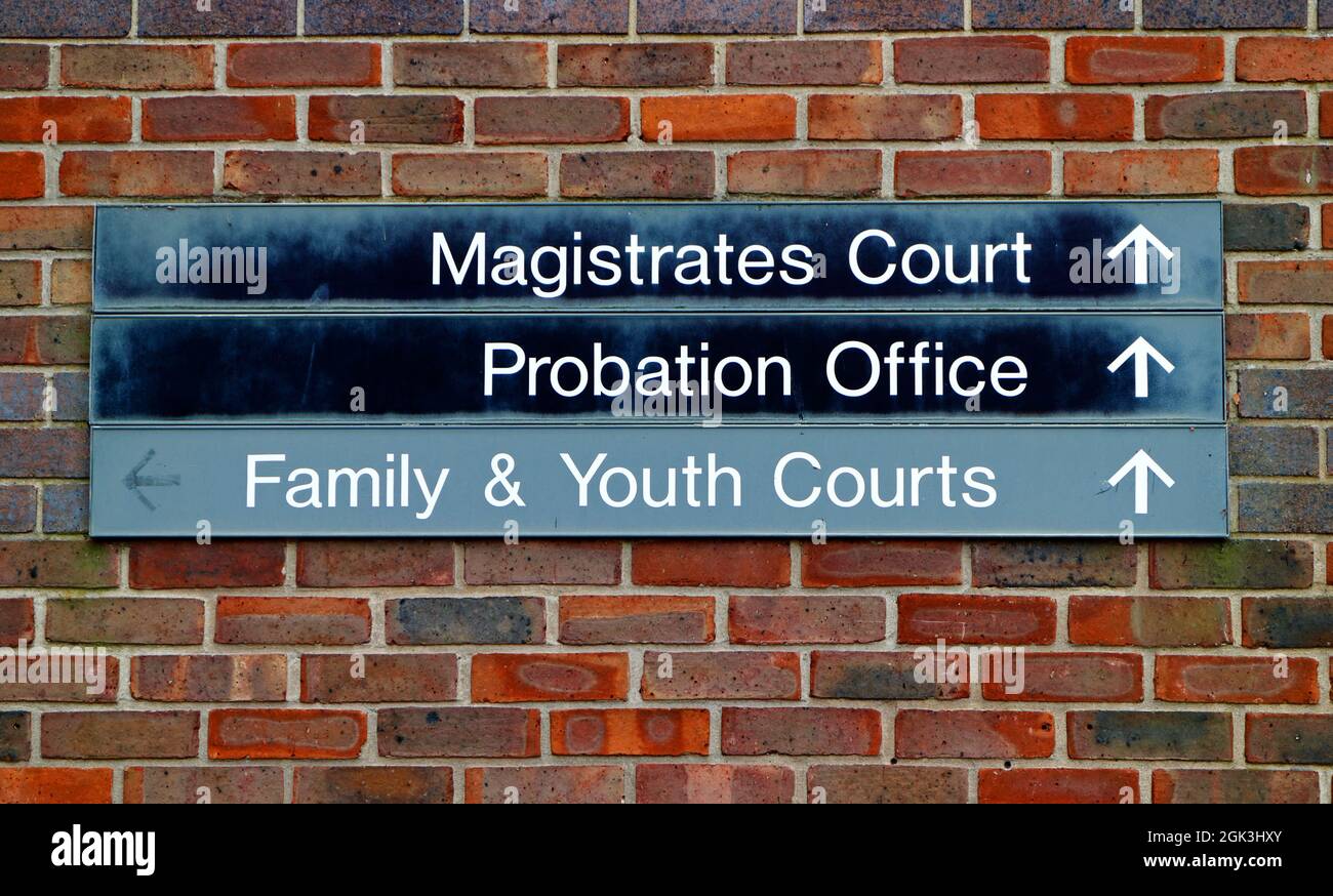 A sign with directions to the Magistrate Court, Probation Office, and Family and Youth Courts at Bishopgate, Norwich, Norfolk, United Kingdom. Stock Photo